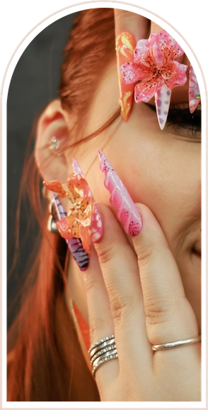 Acrylic pink nail manicure with design